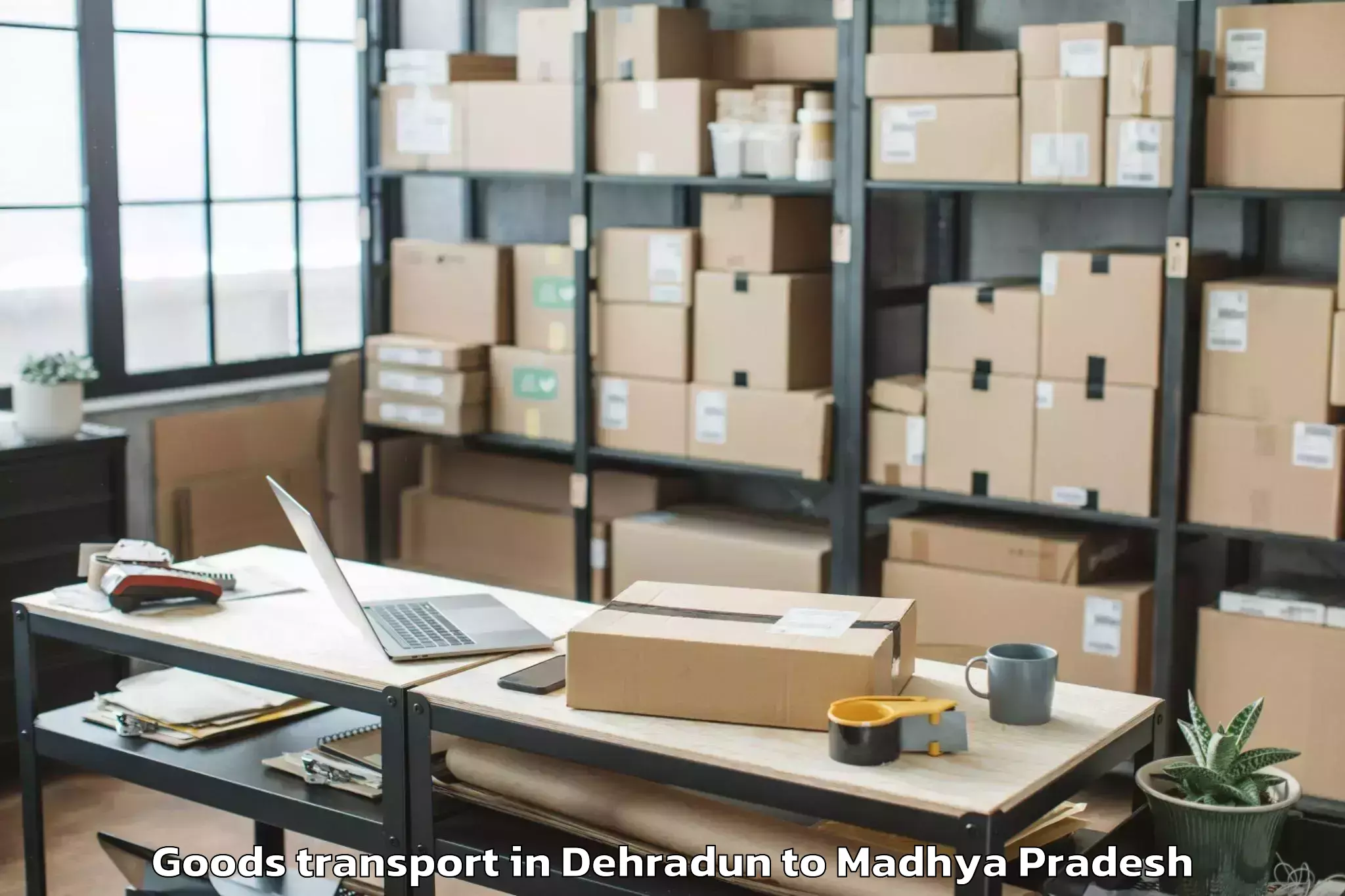 Top Dehradun to Dewas Goods Transport Available